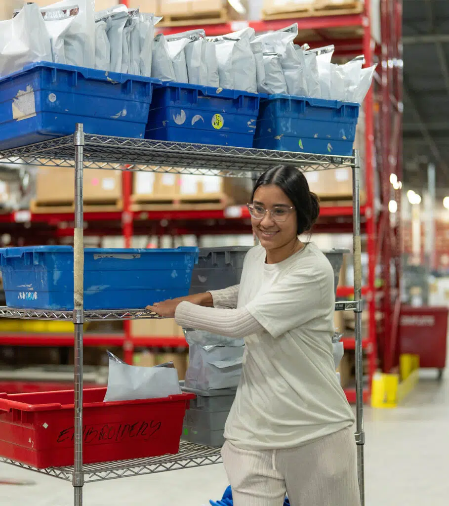 AO Swag employee fulfilling custom merchandise orders
