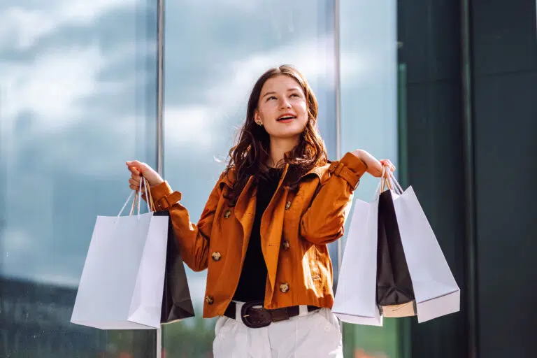 Young woman joyfully shopping